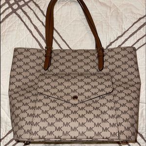 Like new Michael Kors canvas tote with three departments